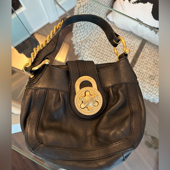 Soft black leather bag, chunky gold turnlock hardware. - Picture 3 of 3